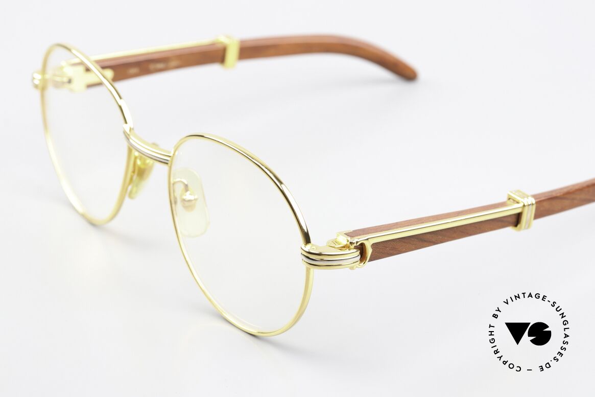 Cartier Bagatelle Bubinga Edelholzbrille Luxus, runde, vergoldete Fassung mit Federscharnieren, Passend für Herren und Damen