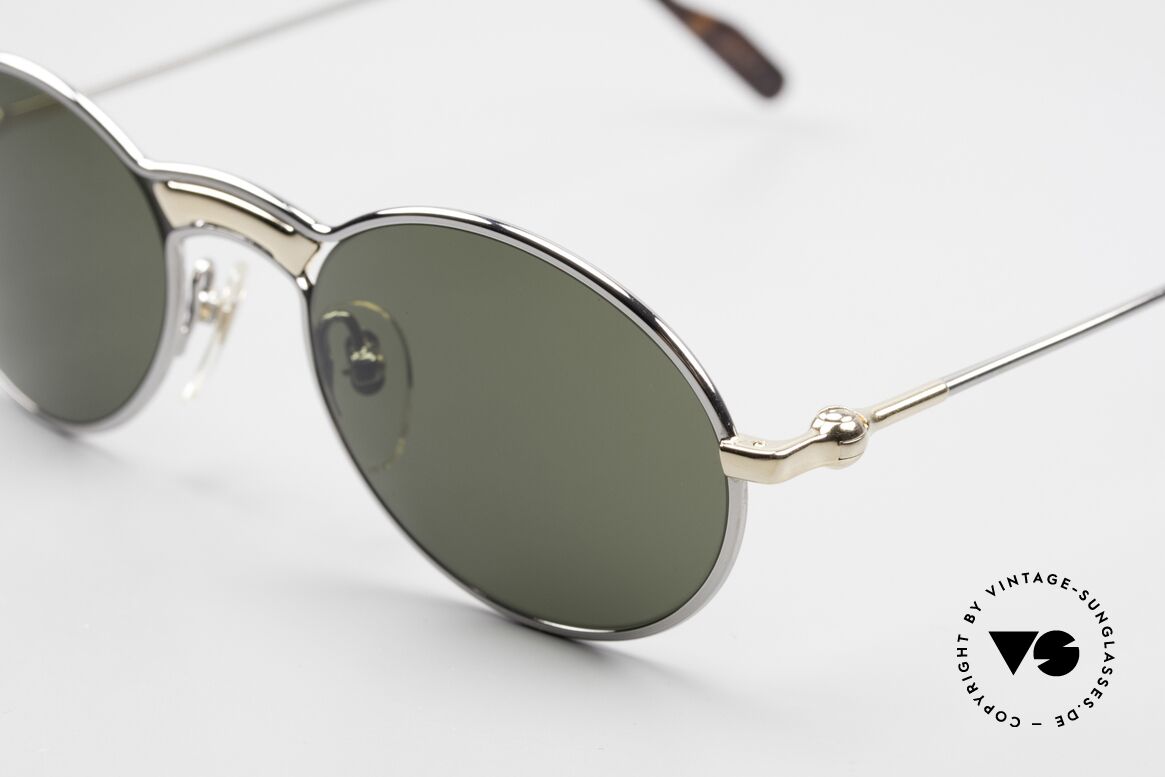 Aston Martin AM01 Ovale Brille James Bond Style, bicolore Fassung: 22kt vergoldet und Ruthenium-plattiert, Passend für Herren