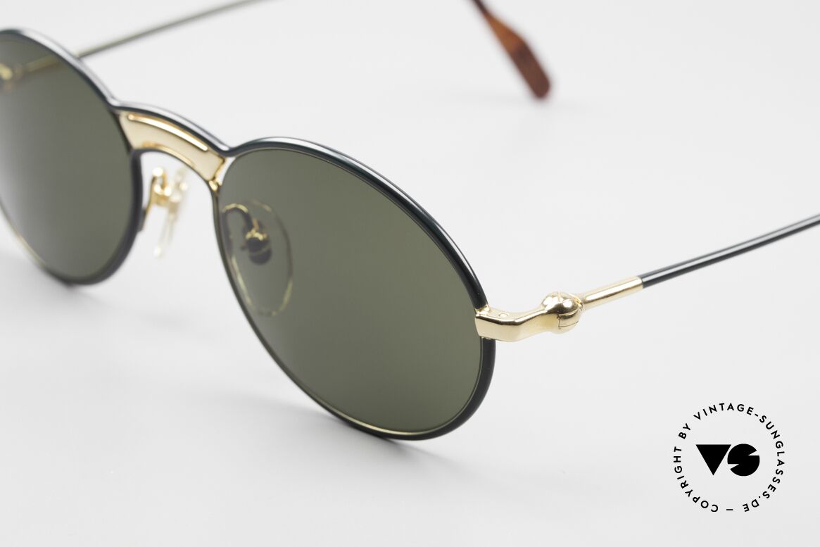 Aston Martin AM01 Ovale Brille Gentleman Style, sehr elegante Fassung in racing-green und 22kt vergoldet, Passend für Herren