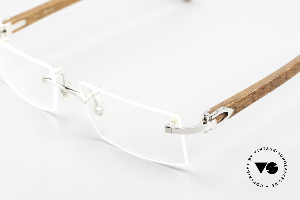 Cartier Formentera Afrika Bubinga HolzBrille, Bügel aus Afrik. Bubinga-Holz mit C-Dekor Gravur, Passend für Herren
