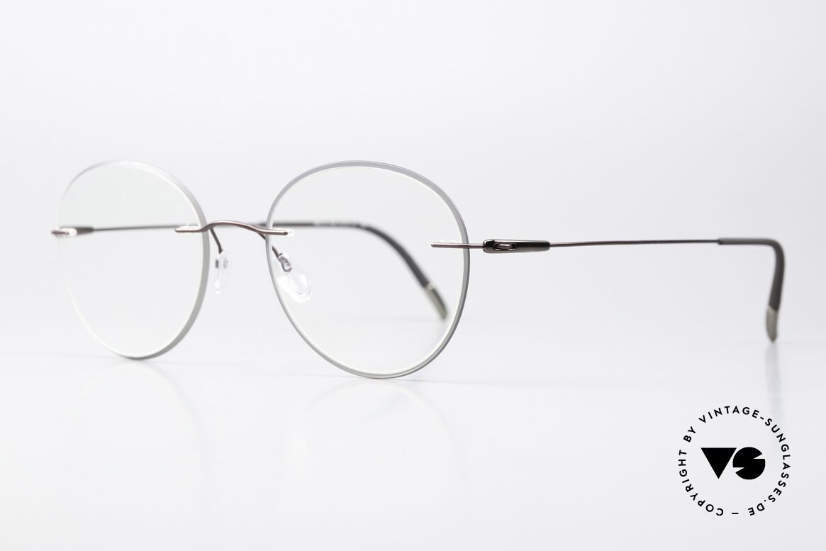 Silhouette 5500 Colorwave Core Accent Serie, eine markant runde Randlosbrille mit "Azetat Kern", Passend für Herren und Damen
