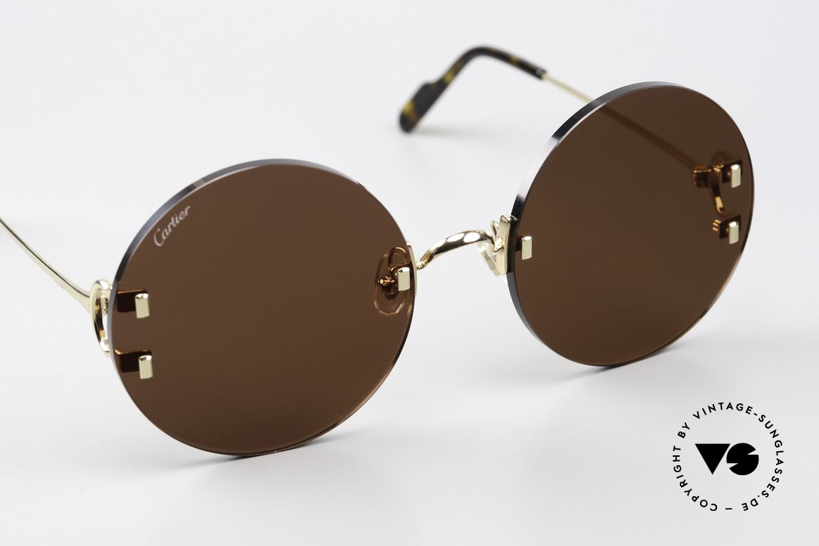 Cartier C-Decor Rimless Feminine Oversize Round, markante C-Decor Bügelscharniere und eckige Nieten, Passend für Damen