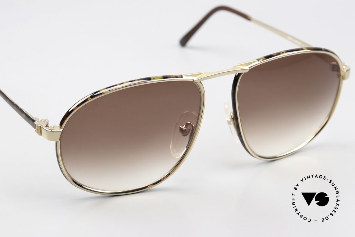 Dunhill 6051 80er Titanium Sonnenbrille, distinguiert kultiviert: ein wahres Gentleman Modell, Passend für Herren