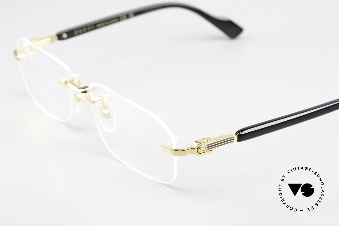 Gucci GG1221O Brille Randlos Unisex Gold, somit auch ein elegantes Damen-Brillenmodell, Passend für Herren und Damen