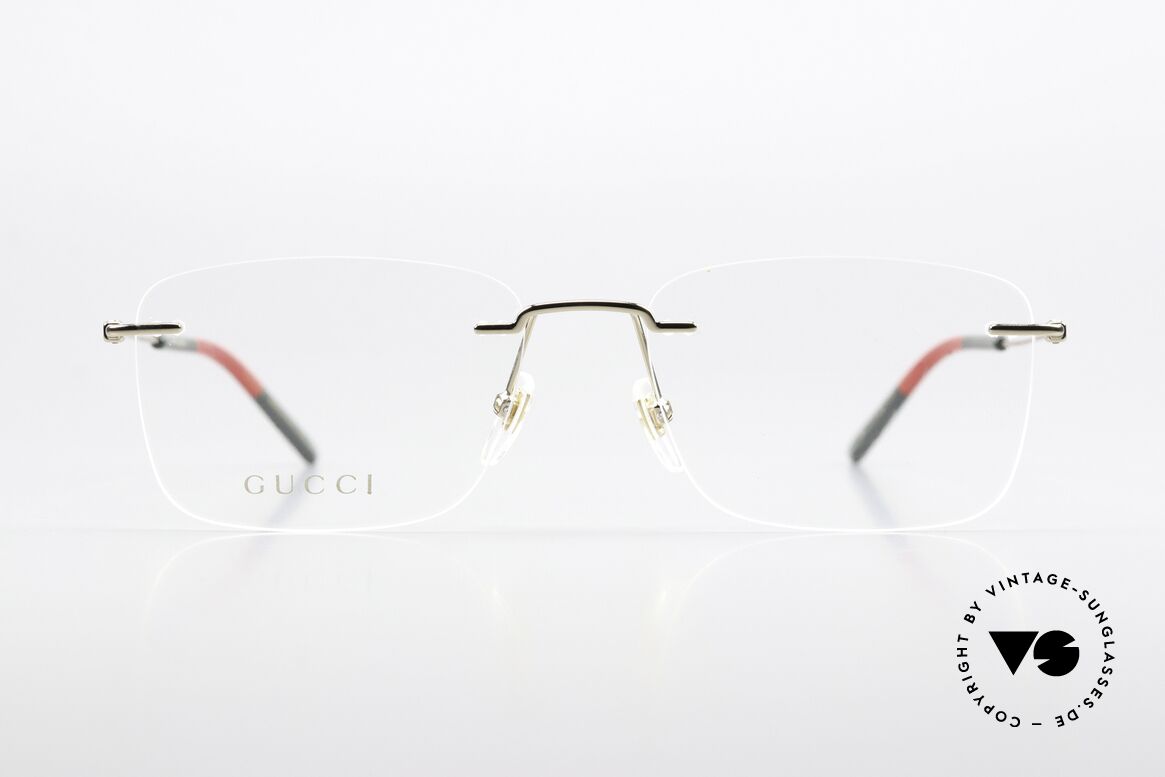 Gucci GG0399O Randlosbrille Made In Italy, goldene Rahmenfront & Bügel in den Gucci-Farben, Passend für Herren