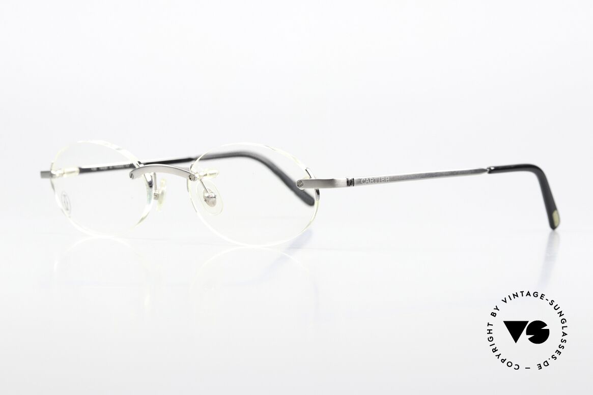 Cartier T-Eye Oval Titanium Brille Randlos, Cartier Katalog Referenz-Nummer ist T8100448, Passend für Herren und Damen