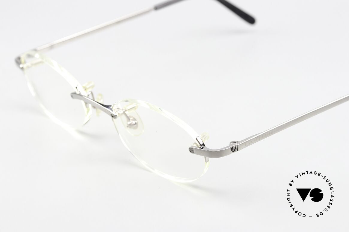 Cartier T-Eye Oval Titanium Brille Randlos, Titanium-Fassung mit edler Platin-Legierung, Passend für Herren und Damen