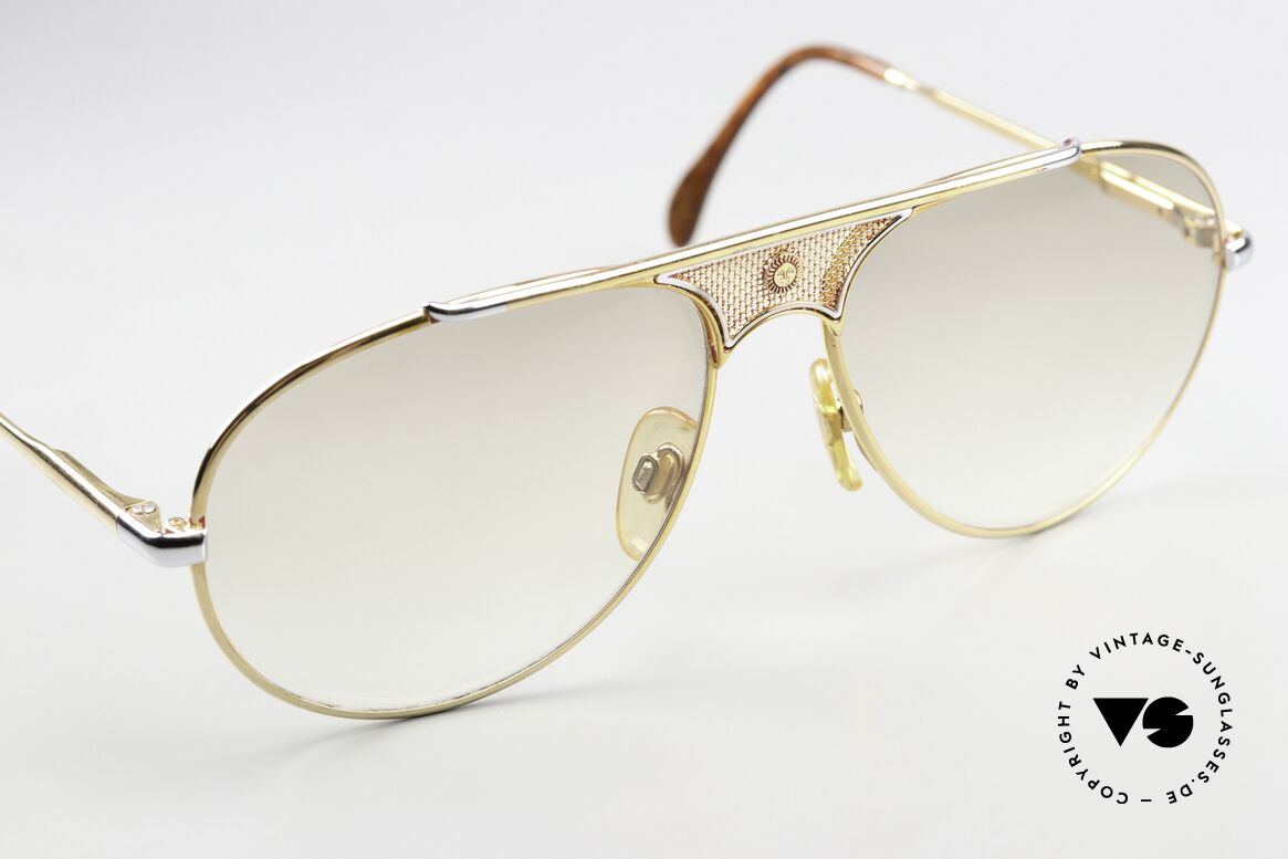 St. Moritz 404 Sonnenbrille Mit Jupiter Symbol, leicht getönte Sonnengläser (daher auch abends tragbar), Passend für Herren und Damen St. Moritz 404 Sonnenbrille Mit Jupiter Symbol, leicht getönte Sonnengläser (daher auch abends tragbar), Passend für Herren und Damen
