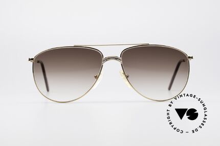 Alpina FM81 West Germany Vintage Brille, markante Brücke in einem edlen Titanium-Muster, Passend für Herren