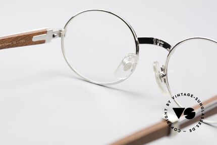 Cartier Giverny Ovale Edelholz Platin Brille, ovale, Platin-Luxus-Fassung mit Feder-Scharnieren, Passend für Herren und Damen