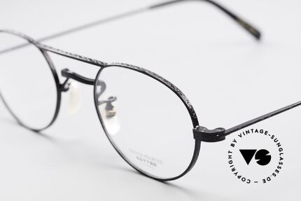 Oliver Peoples August Außergewöhnliche 90er Brille, kombiniert mit dem intellektuellen Styling der 1960er, Passend für Herren und Damen