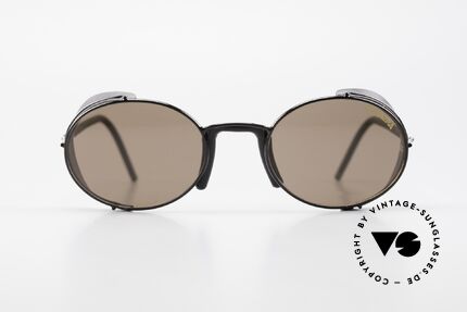 Carrera 5580 90er Steampunk Sportbrille, matt-schwarzer Rahmen in ungewöhnlicher Form, Passend für Herren und Damen