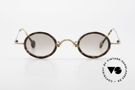 L.A. Eyeworks LINK 143 Rund Ovale Sonnenbrille 90er, handgefertigt, mit den charakteristischen Bügelenden, Passend für Herren und Damen