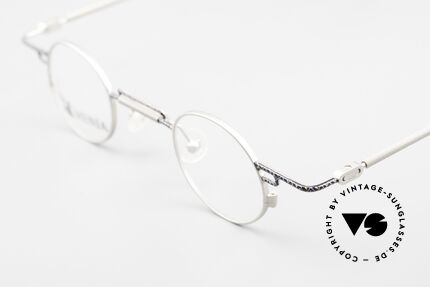 Menia 4012 Runde 90er Brille Bauhaus Stil, leichter Titan-Rahmen (12g) mit dezentem Muster, Passend für Herren und Damen