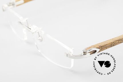 Cartier C-Decor Rimless Afrika Bubinga HolzBrille, Bügel aus Afrik. Bubinga-Holz mit Federscharnier, Passend für Herren und Damen