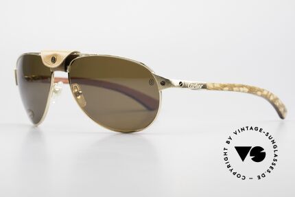 Cartier Santos Dumont Polarisierend Holz Und Leder, Mod. T8200940, Gelbgold gebürstet, Gr. 61x16x130, Passend für Herren Cartier Santos Dumont Polarisierend Holz Und Leder, Mod. T8200940, Gelbgold gebürstet, Gr. 61x16x130, Passend für Herren