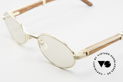 Cartier Sully Automatik Mineral Gläser, ovale, vergoldete Fassung mit Feder-Scharnieren, Passend für Herren und Damen