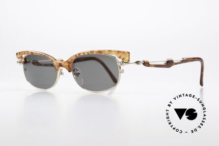 Jean Paul Gaultier 56-0024 Geniale 2 in 1 Sonnenbrille, daher 2 komplett unterschiedliche Sonnenbrillen-Stile, Passend für Damen