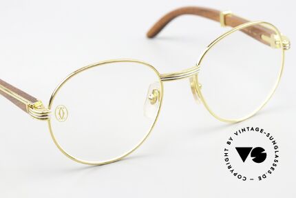 Cartier Bagatelle Runde Holzbrille 90er Jahre, mit orig. Verpackung (Etui, Zertifikat, Putztuch..), Passend für Herren und Damen