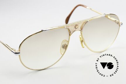 St. Moritz 404 Sonnenbrille Mit Jupiter Symbol, leicht getönte Sonnengläser (daher auch abends tragbar), Passend für Herren und Damen St. Moritz 404 Sonnenbrille Mit Jupiter Symbol, leicht getönte Sonnengläser (daher auch abends tragbar), Passend für Herren und Damen